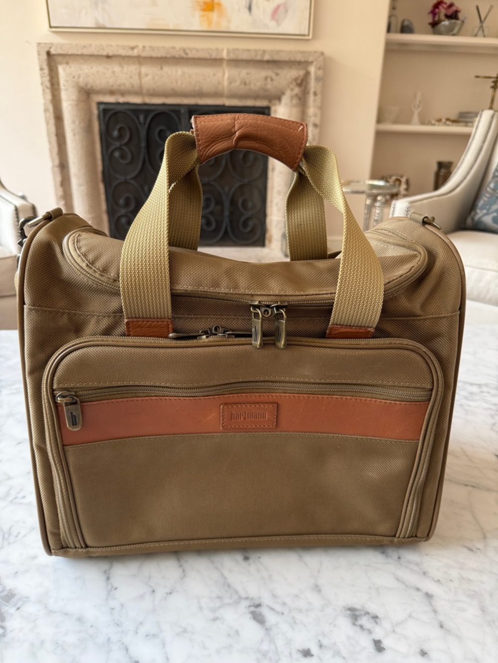 Hartmann overnight carry on bag with trolly sleeve. Khaki with 11 pockets.